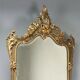 Ancient baroque console with a wooden mirror, Italy, late 19th century.