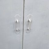 Old industrial metal cabinet in white and blue.