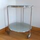 1970s stainless steel pedestal table with two glass tops