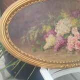 Elliptical painting still life bouquet of flowers oil on wood by Lillie Honnorat