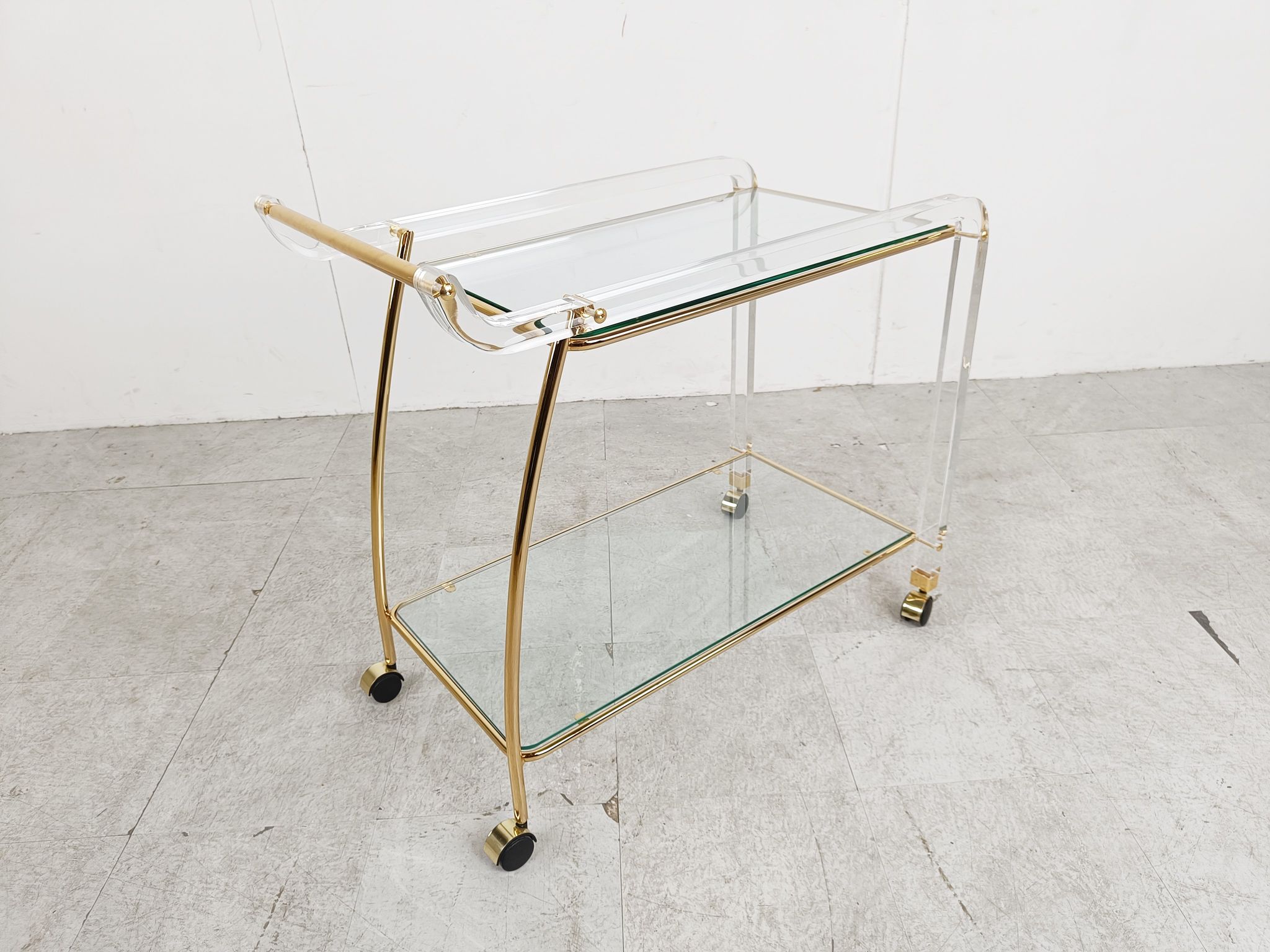 Brass and lucite drinks trolley, 1970s