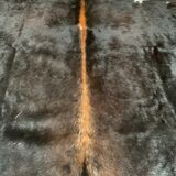 Black cowhide carpet