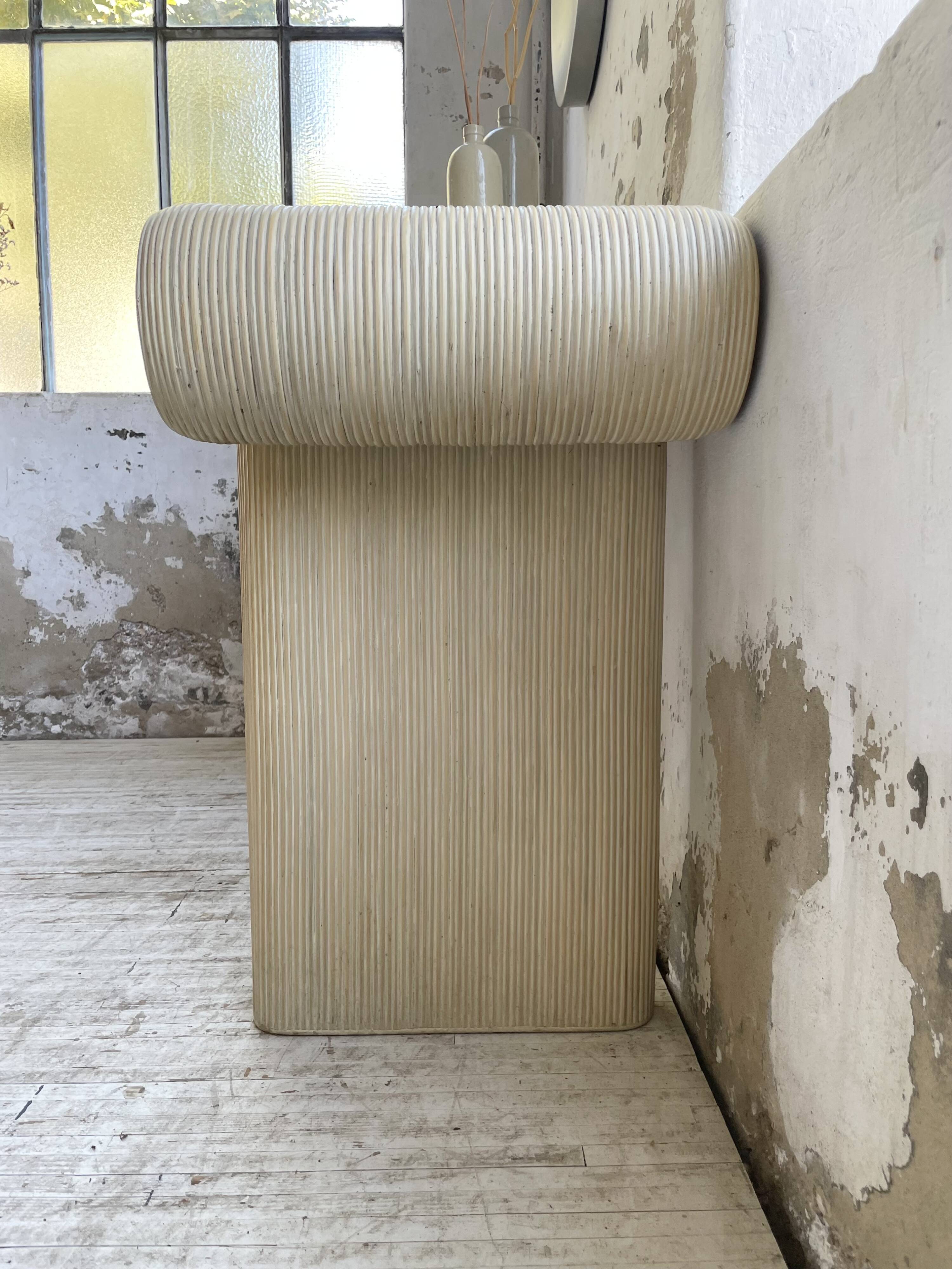 70s console in tropicalist rattan