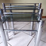 Pull-out tables in glass and metal 80 years