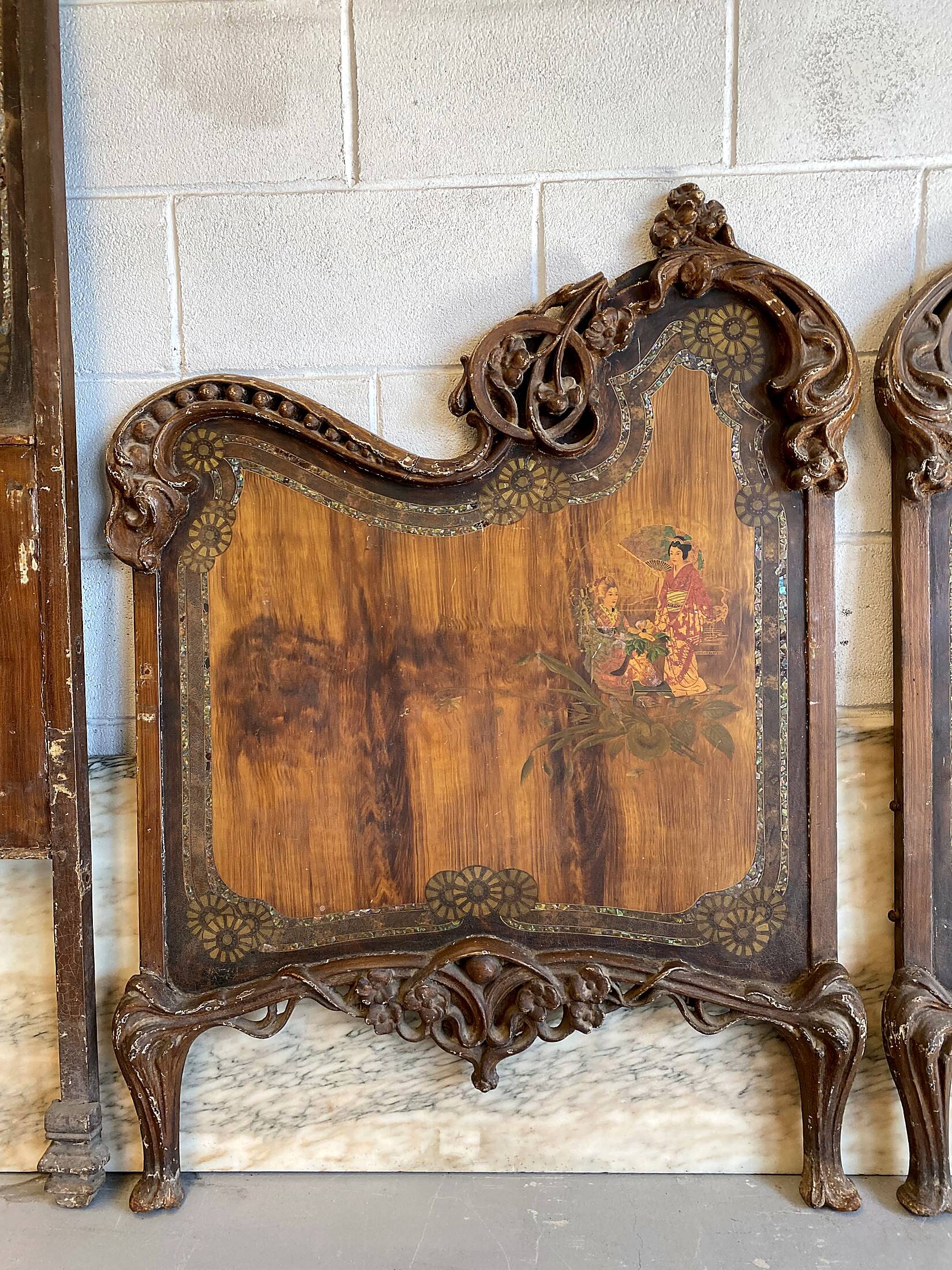 Pair of Art Nouveau cast iron headboards, Italy circa 1900