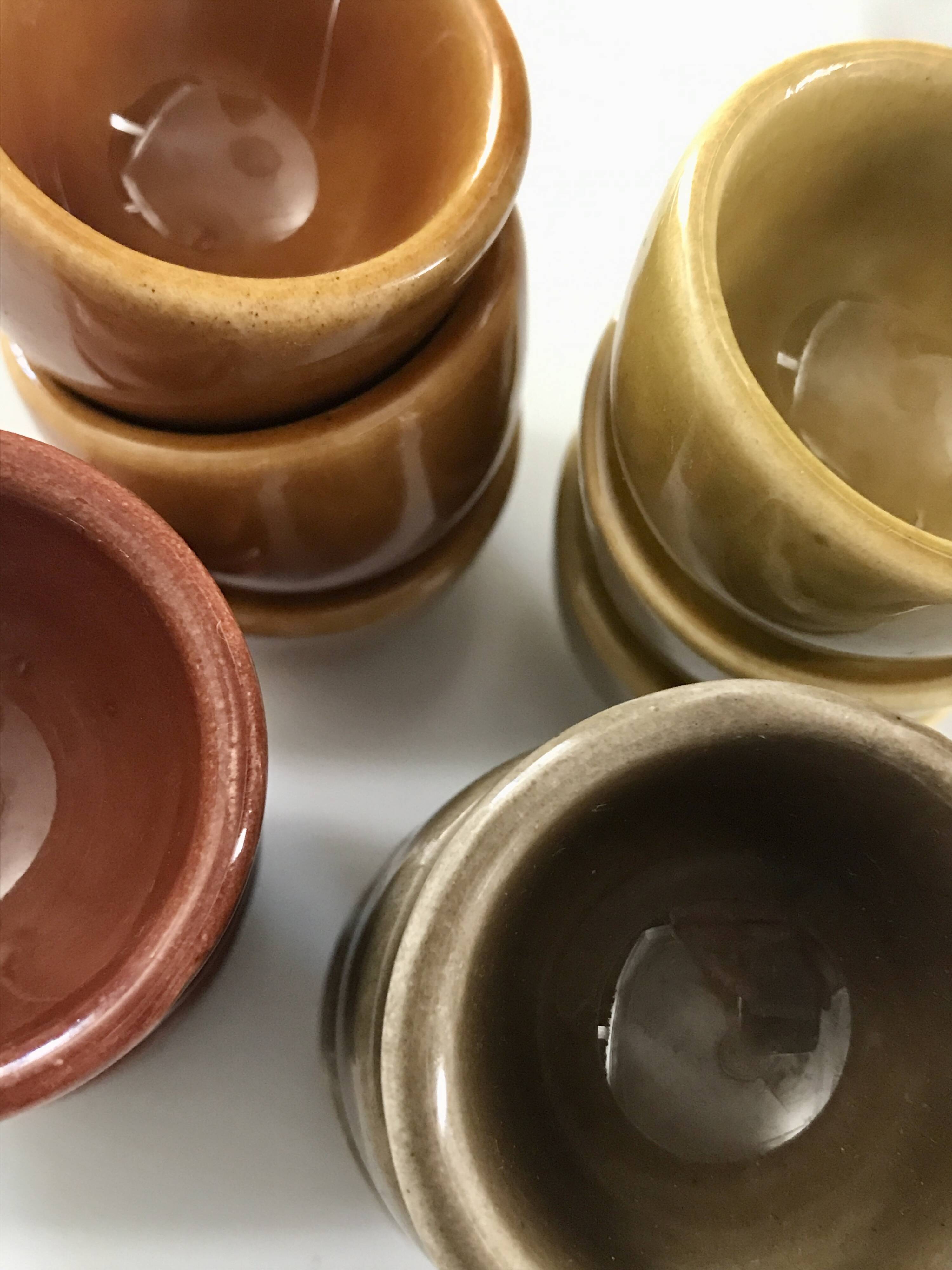 Set of 12 small multi-colored ceramic candle holders