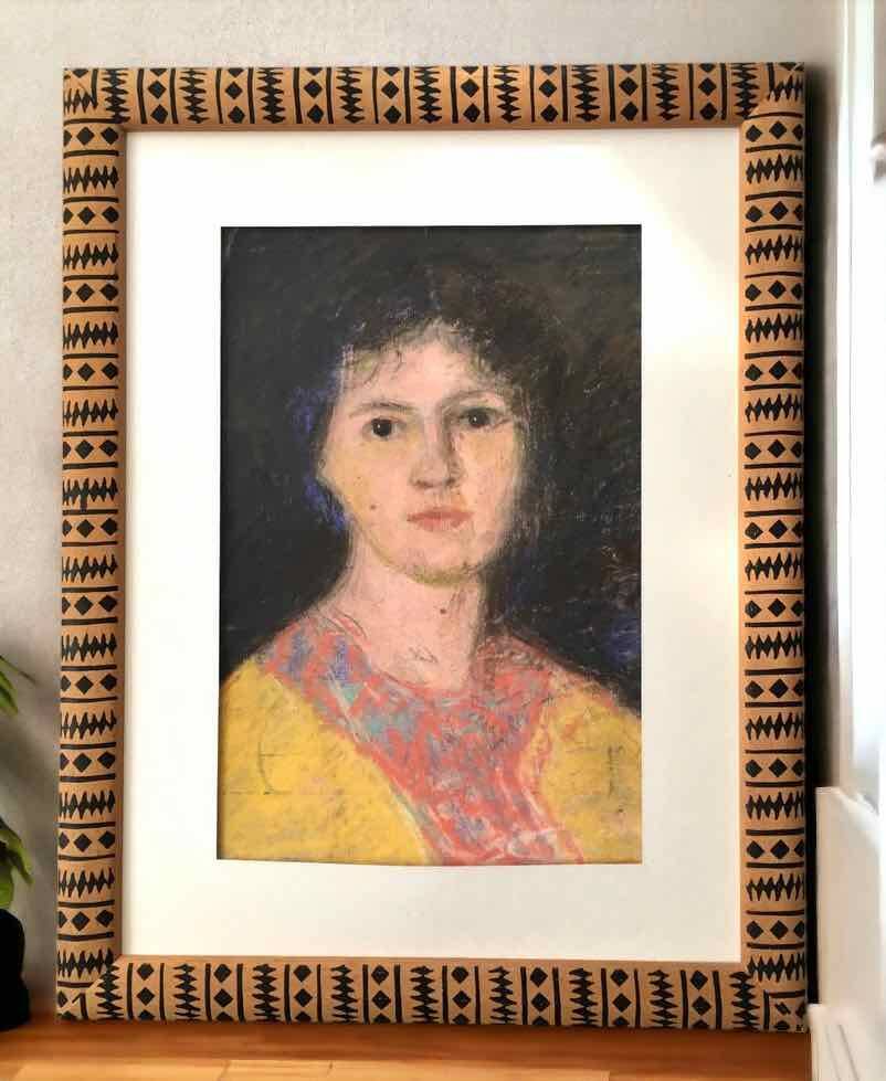 Old pastel portrait of young woman from the 1930s