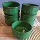 Set of 7 glazed terracotta cups