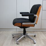 Vintage swivel office armchair in black leather and wood by Giroflex 60s