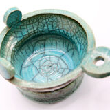 Atypical cup in turquoise and gray raku with signature