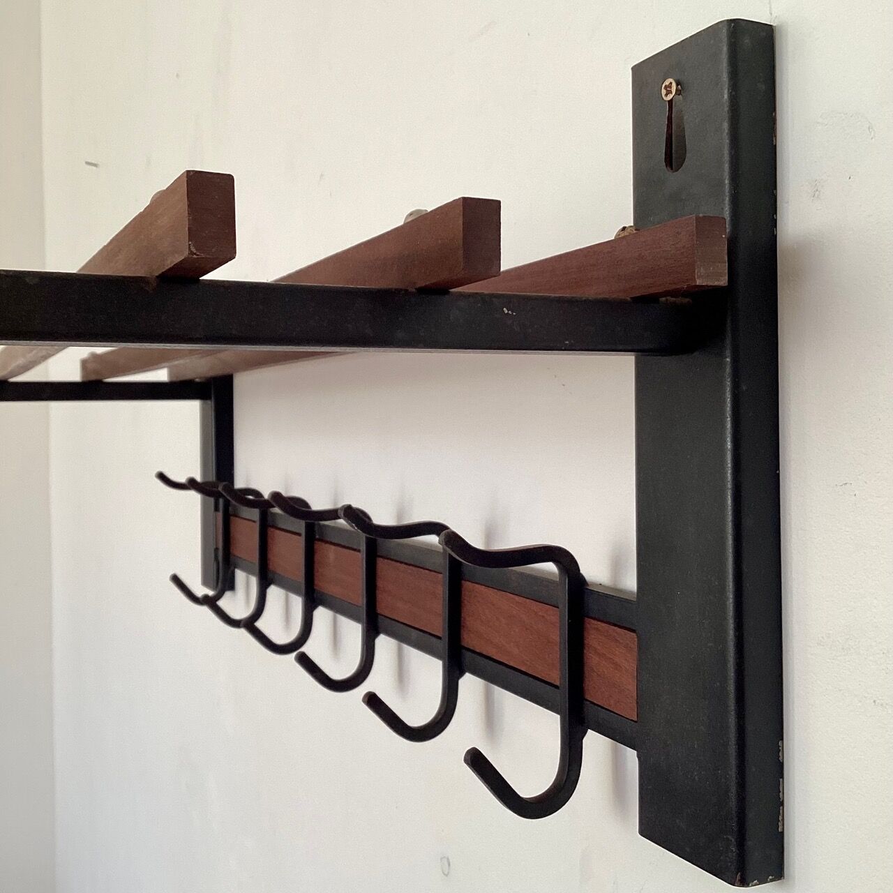 Wall-mounted coat rack