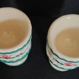 Pair of vintage earthenware egg cups with hand-painted decoration