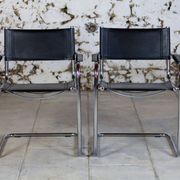 Pair of Bauhaus cantilever armchairs in chromed metal and leather, 1970