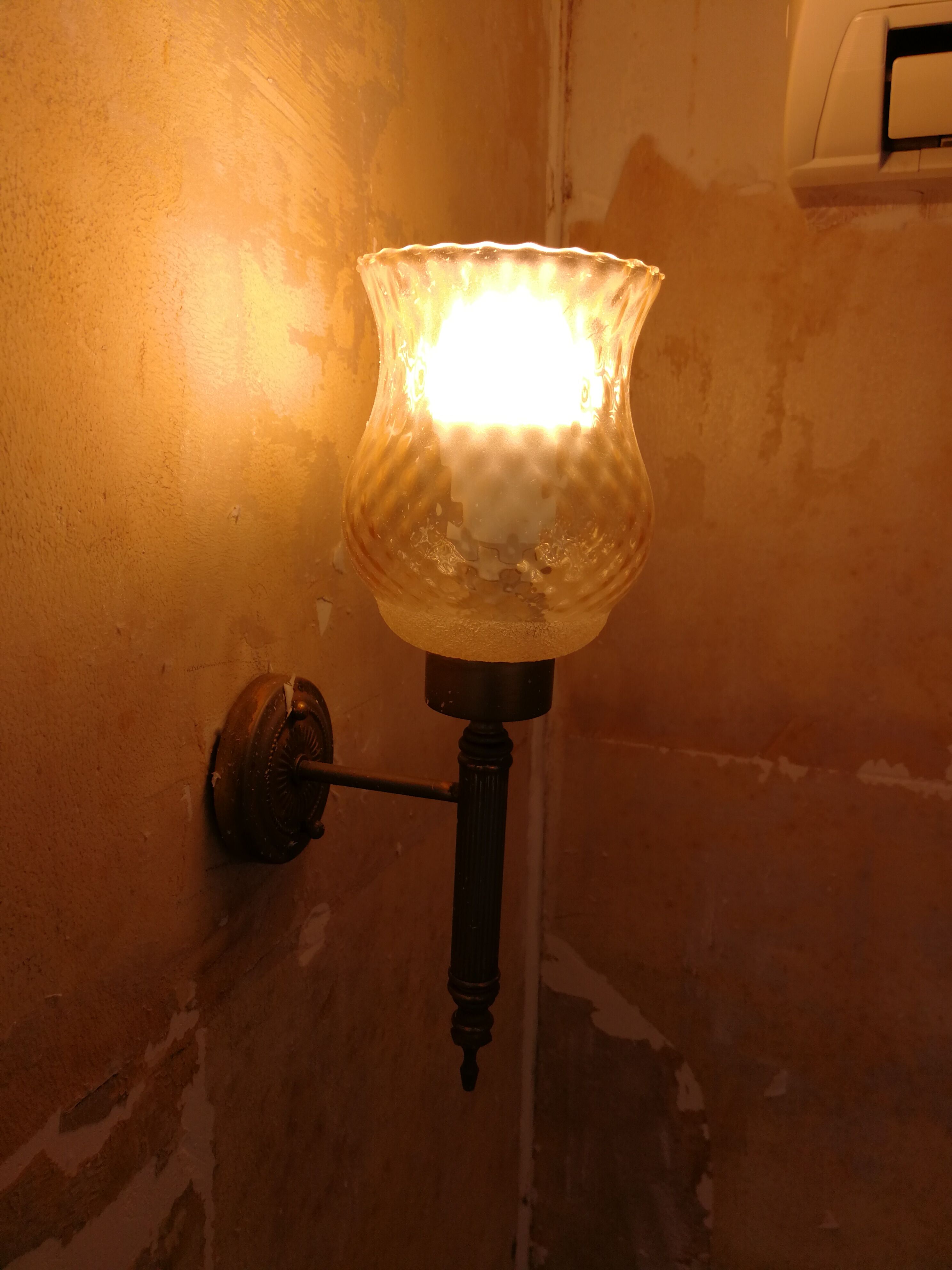 Glass and brass sconces