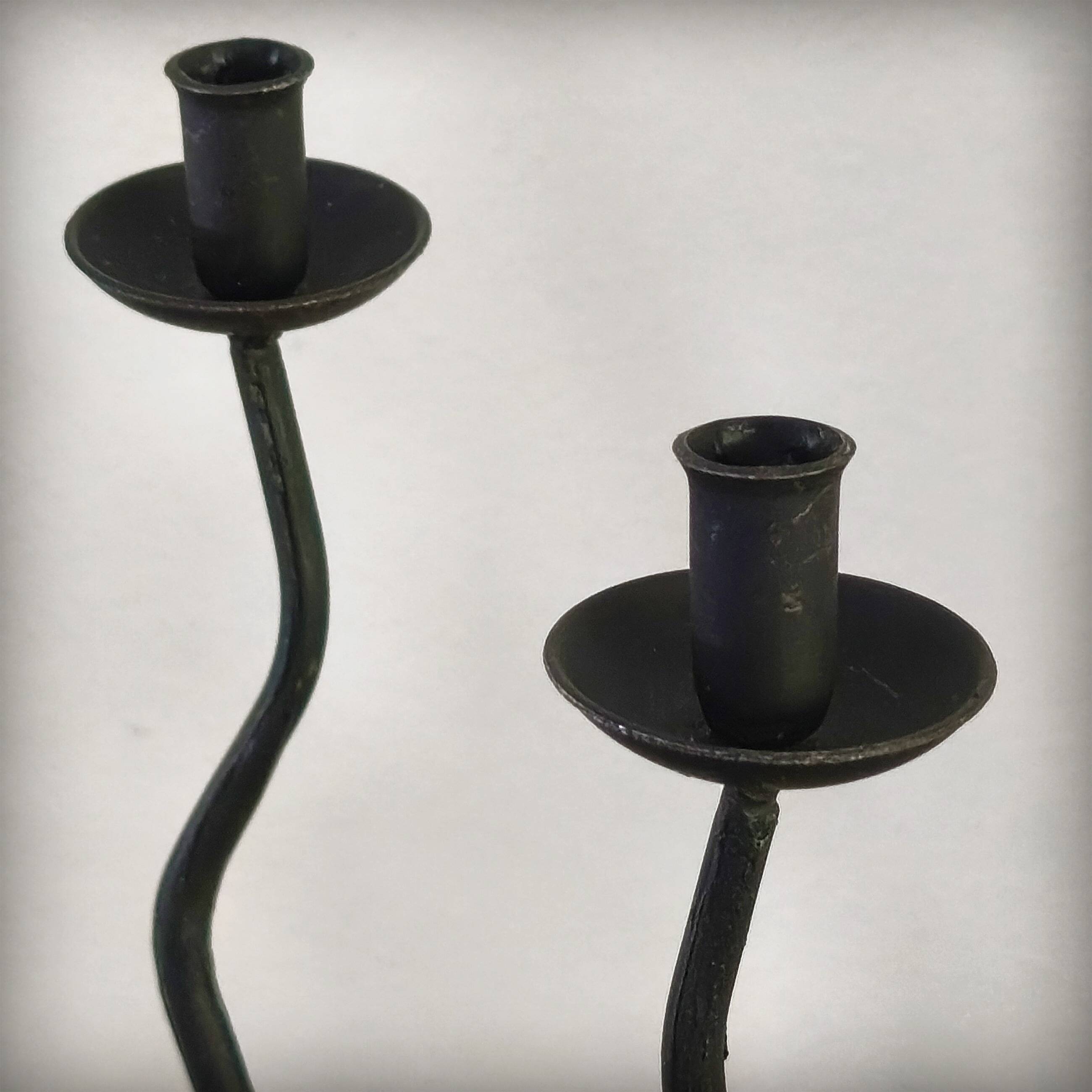 Pair of postmodern brutalist candlesticks in wrought iron, France, 1980s