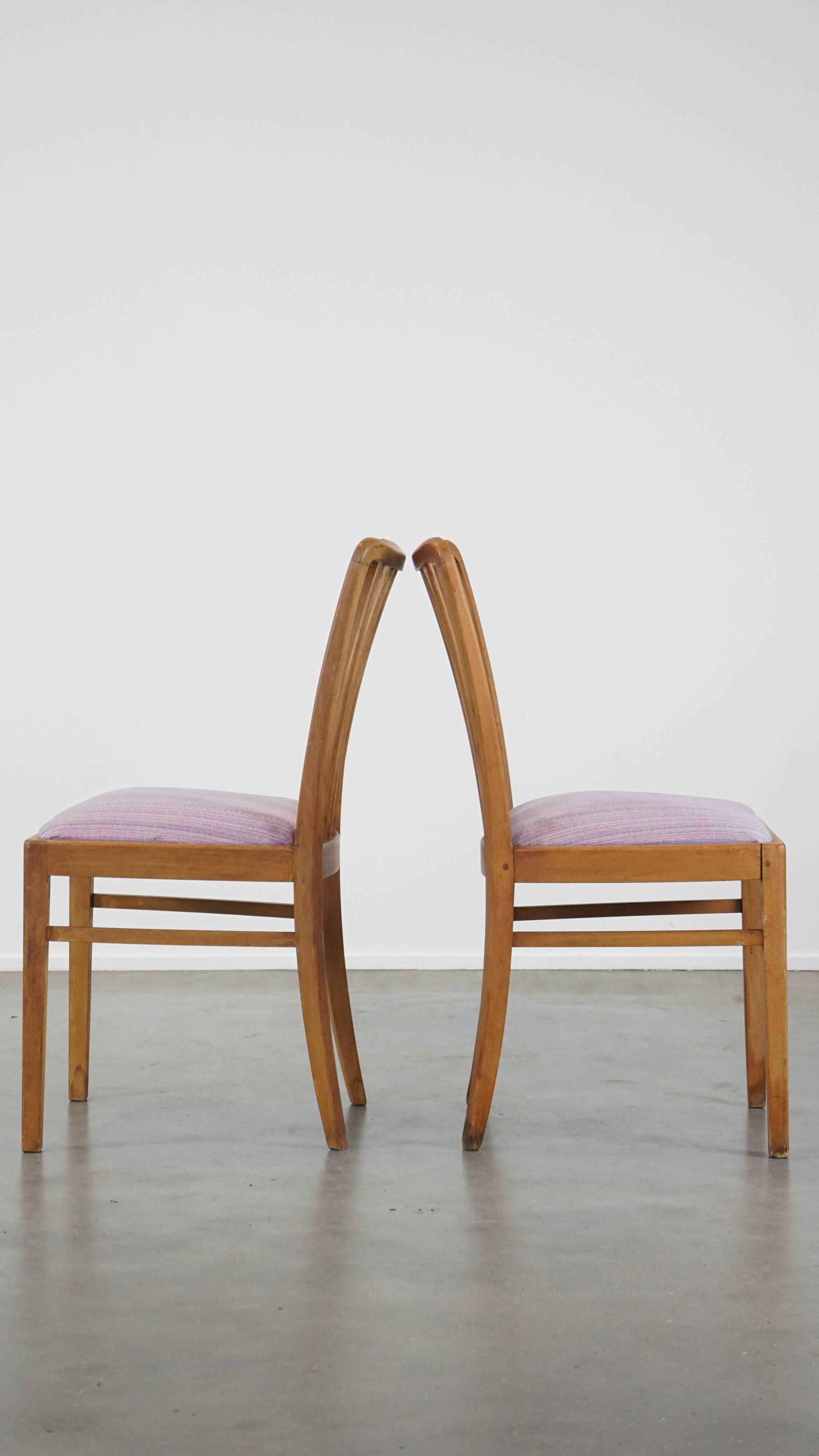 Set of 2 vintage dining chairs from the 1970s with spindle backrest and fabric seat