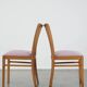 Set of 2 vintage dining chairs from the 1970s with spindle backrest and fabric seat