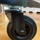 Four-wheeled tables by Gae Aulenti for Fontana Arte