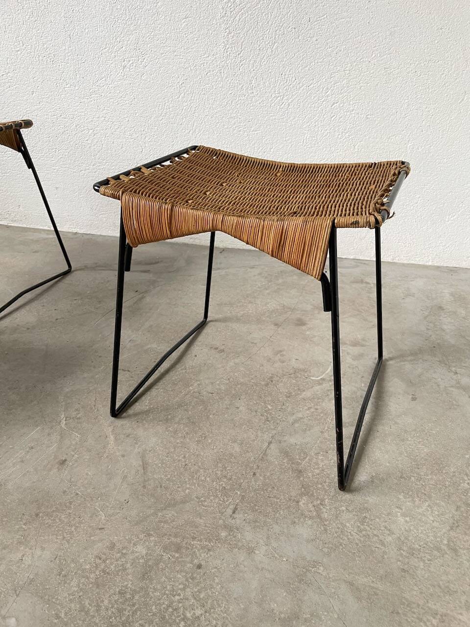 Set of three Raoul Guys wicker and metal stools