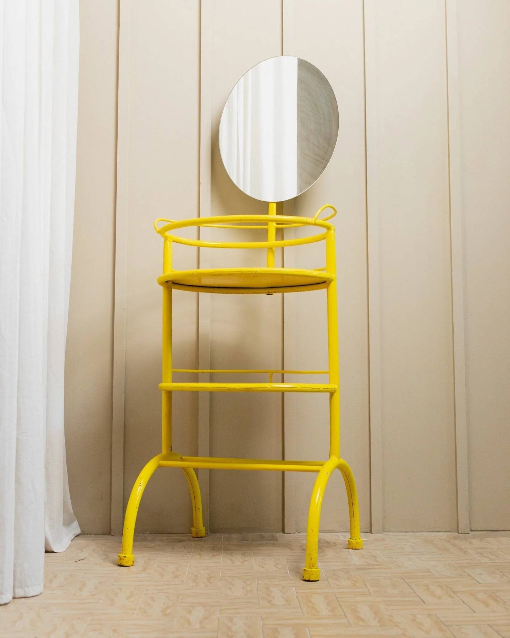 Yellow metal side table with swiveling oval mirror and two tray shelves, vintage 1960s Italy