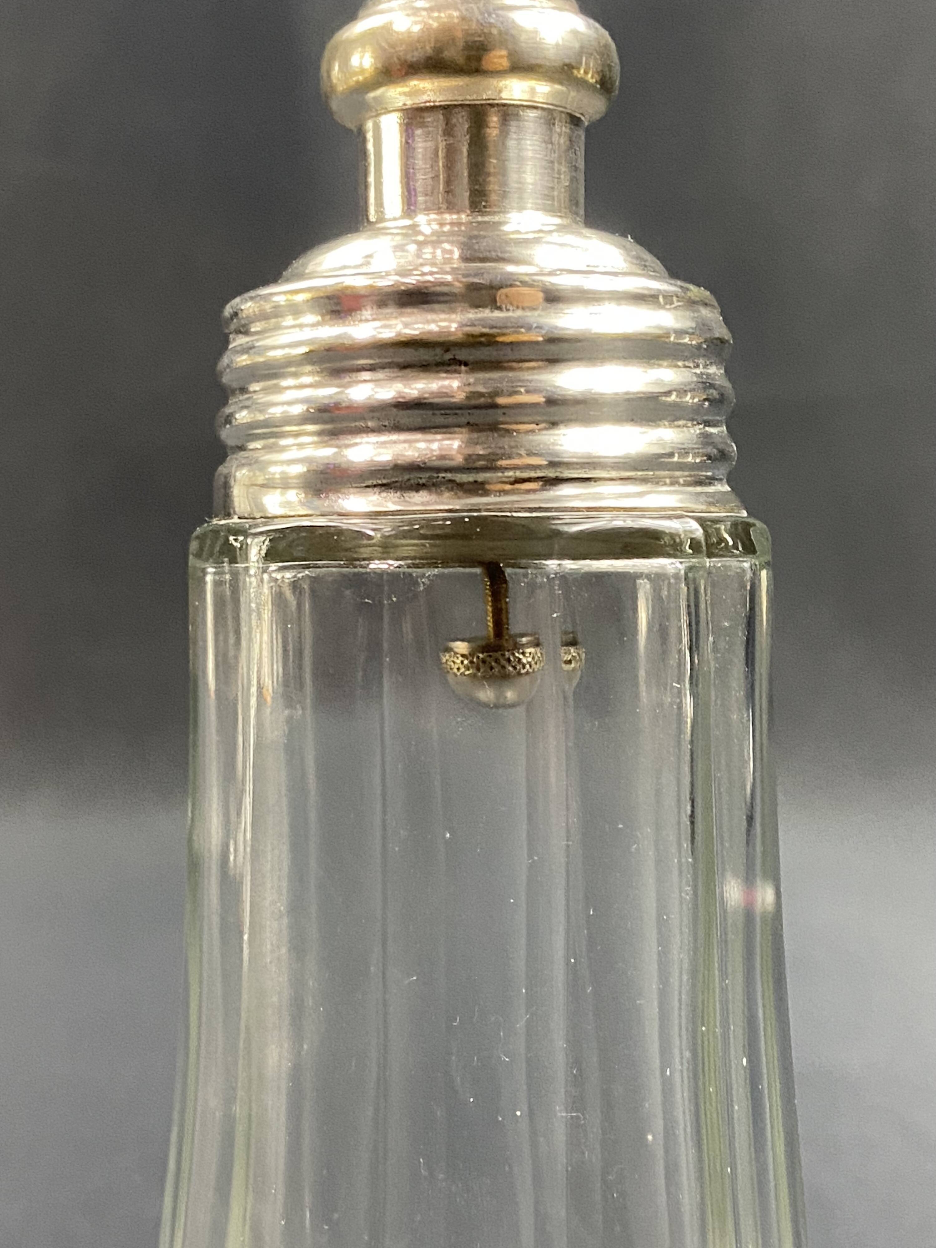 Glass and silver metal sugar shaker