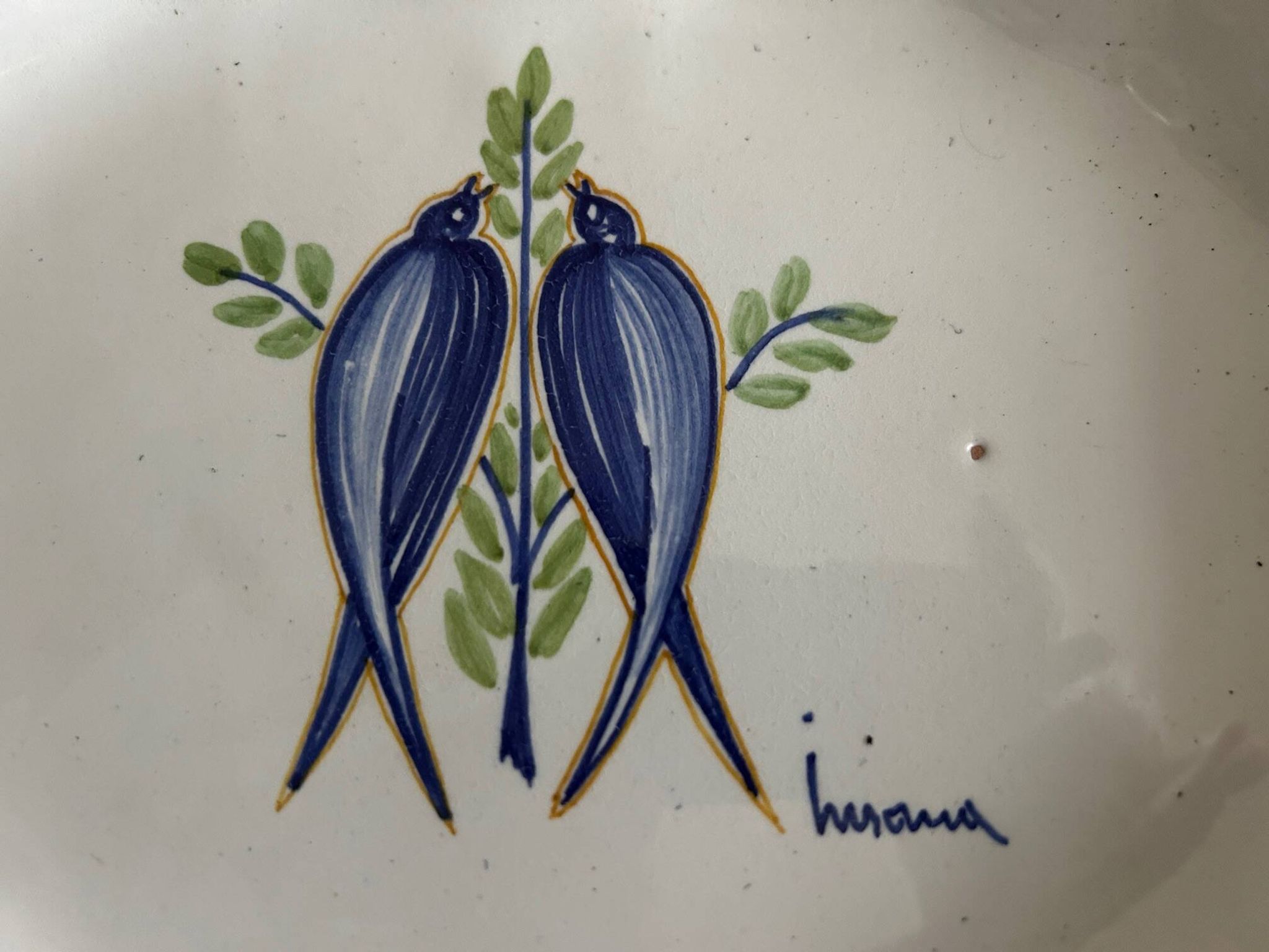vintage plate in earthenware with birds