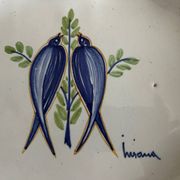 vintage plate in earthenware with birds