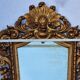 Antique wall mirror in carved gilded wood, Louis XV style, 19th century, 98 x 57 cm.