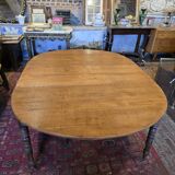 12-foot round oak table with 7 extensions / 20 people