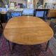 12-foot round oak table with 7 extensions / 20 people