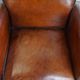 Vintage set of 4 sheepskin leather dining chairs on castors