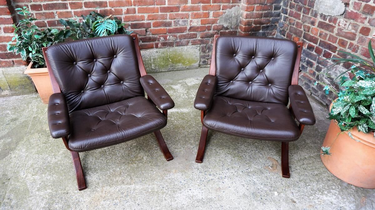 Pair of Scandinavian leather armchairs