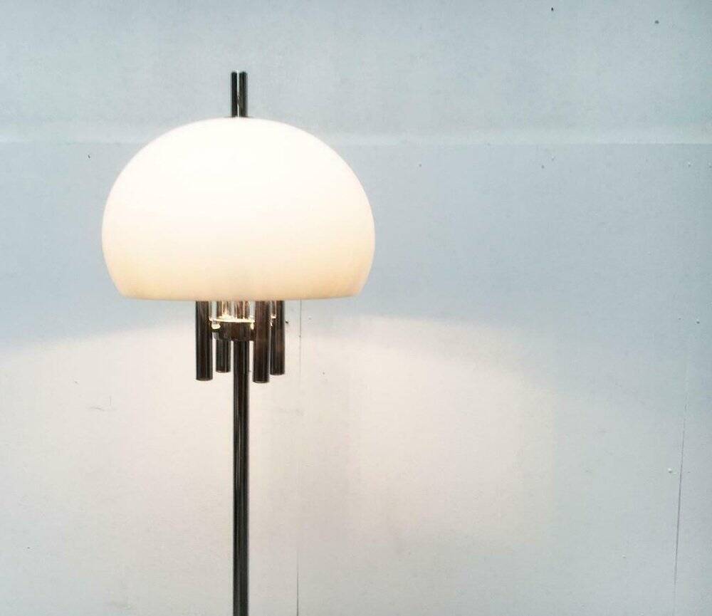 Italian space-style floor lamp from the 1960s with a stone base.