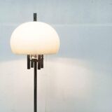 Italian space-style floor lamp from the 1960s with a stone base.