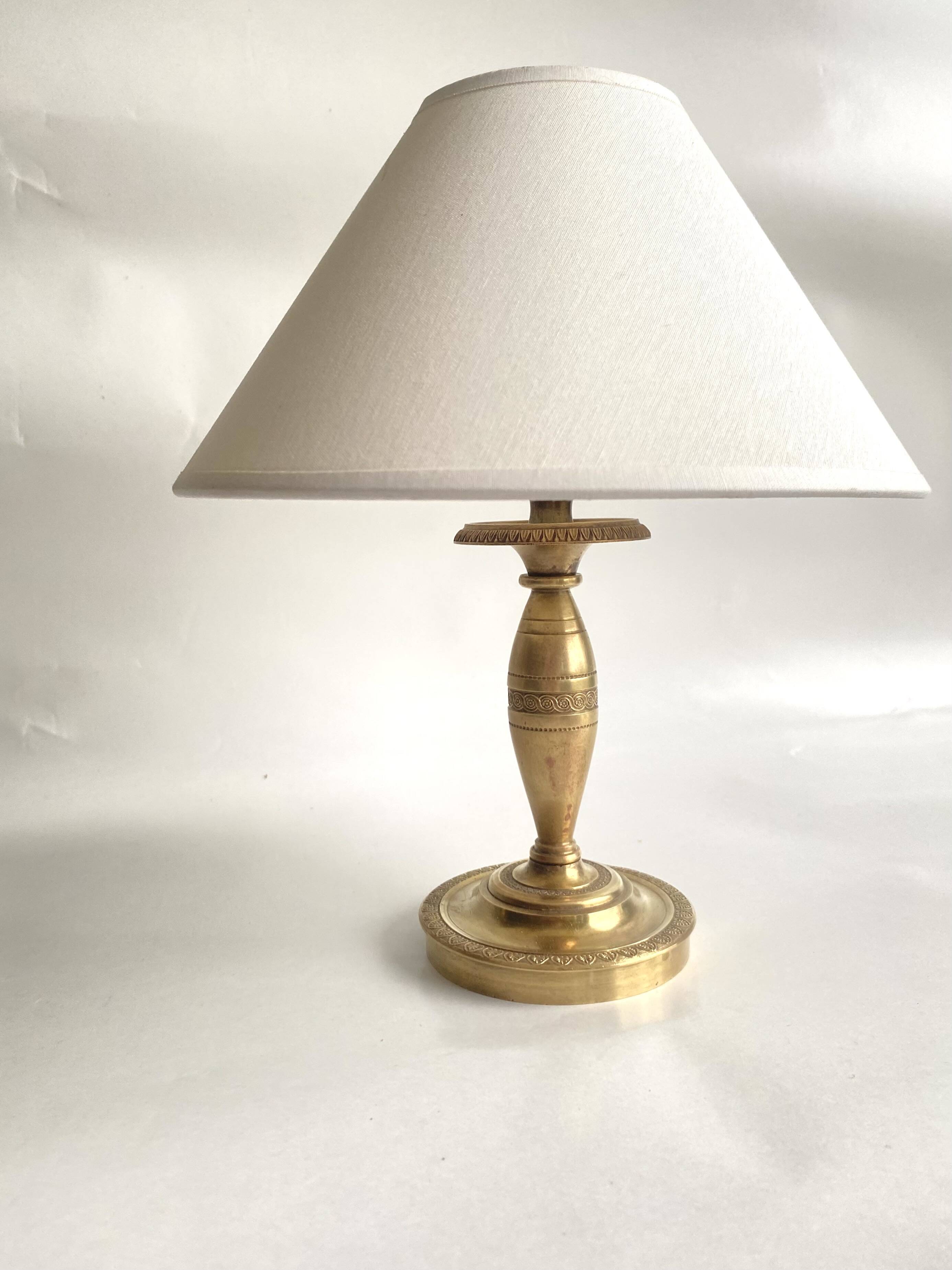 2 brass lamps