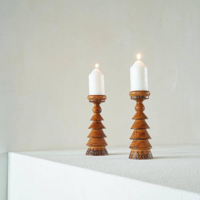 Pair of Scandinavian lacquered wooden candle holders