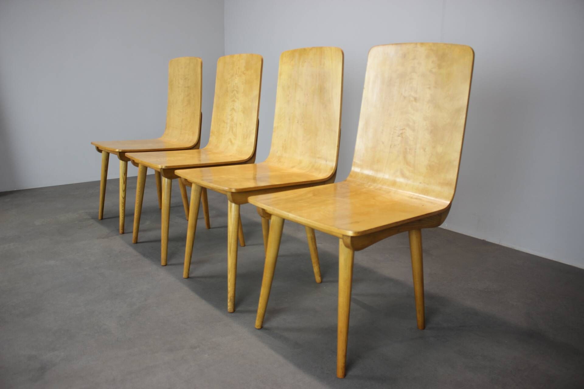 Set of 4 vintage wooden dining chairs in mid-century modern style, Europe, 1970s.