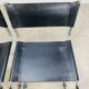 Paire de chaises cantilever simili cuir noir et chrome