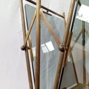 Neo-classical brass magazine rack in the spirit of Maison Jansen.