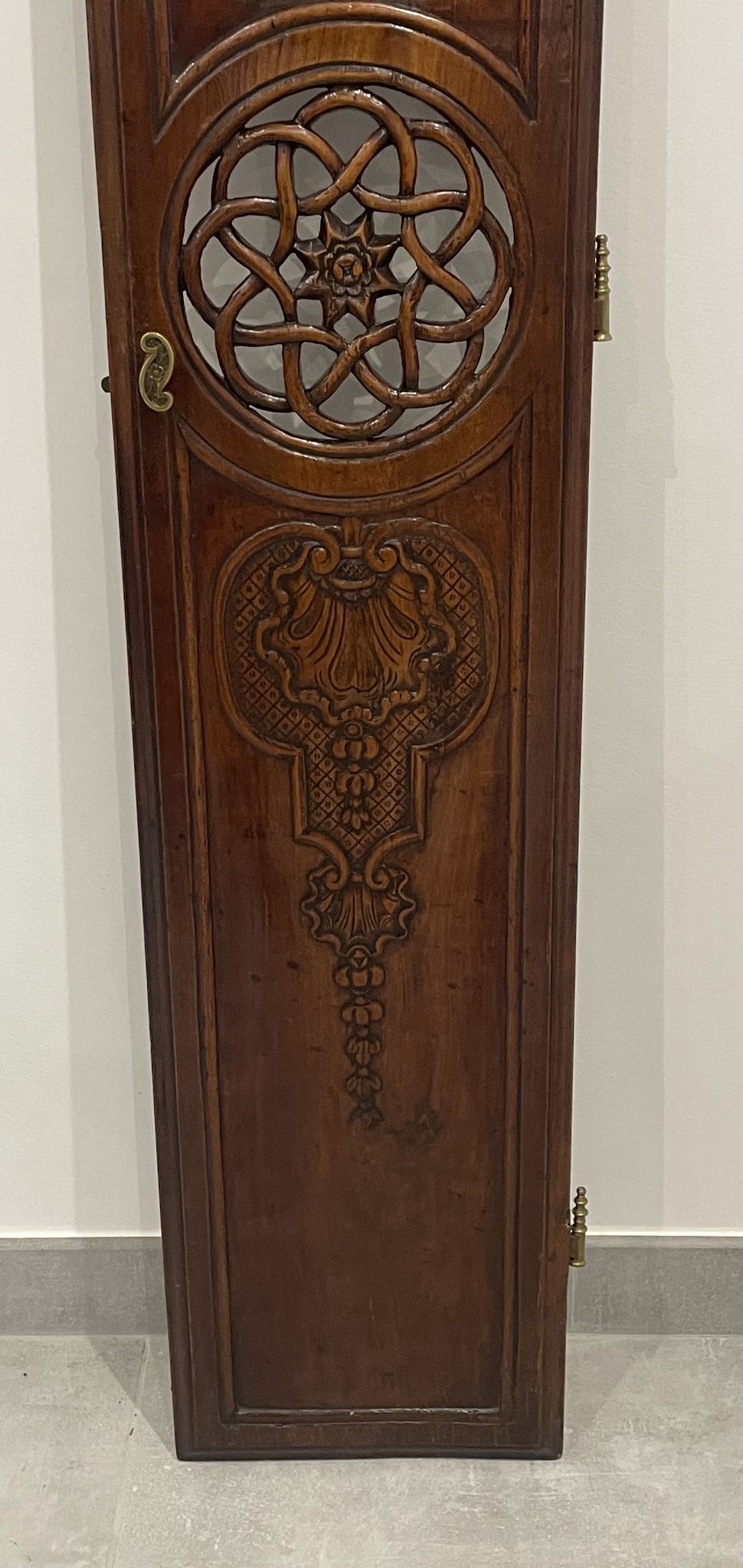 Clock door carved and openwork wood