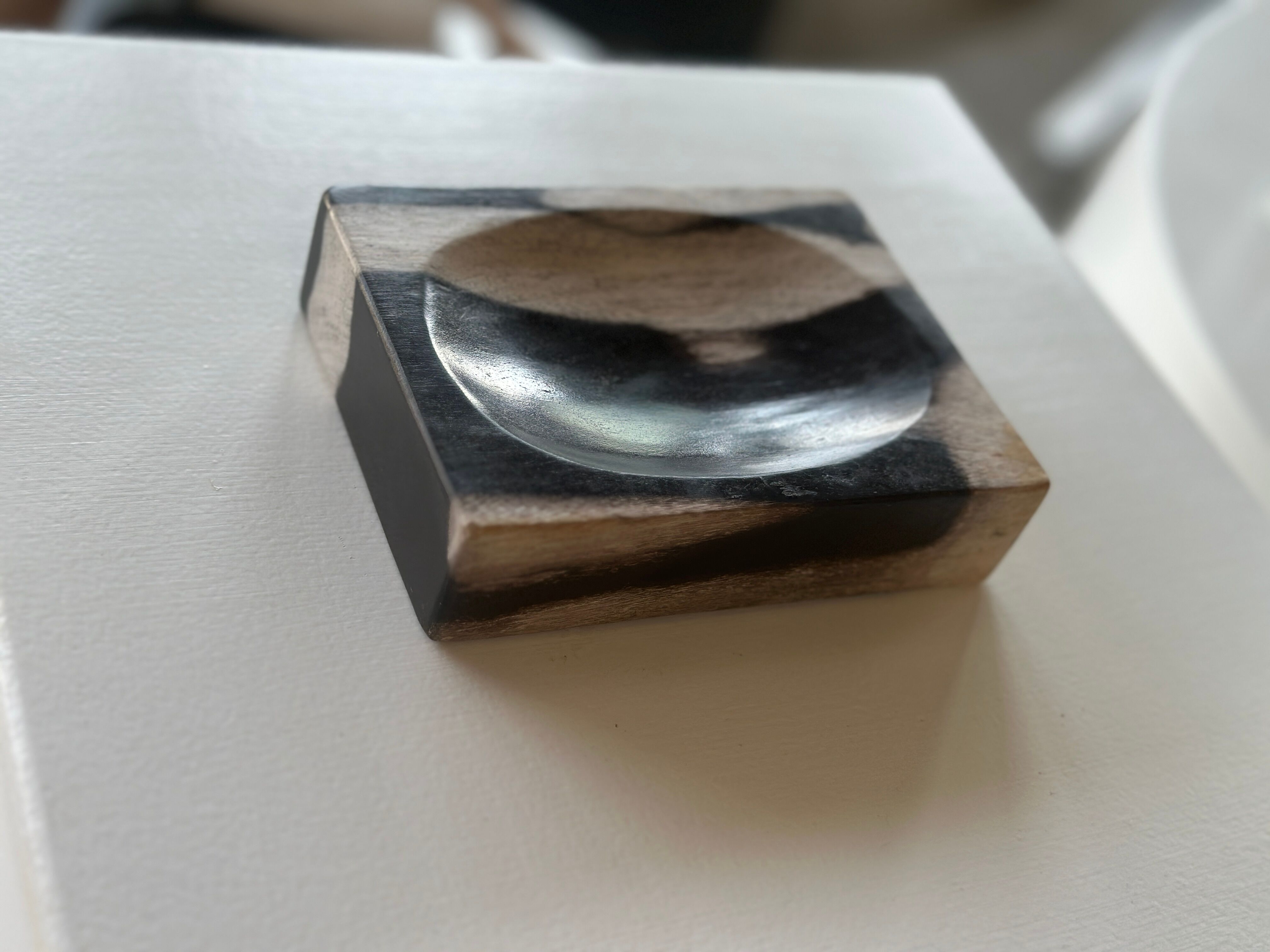 Symmetrical multicolored petrified wood soap dish
