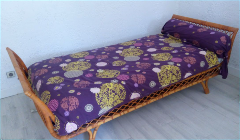 Vintage rattan sofa bed