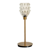 Table lamp with an antique glass lampshade in the shape of a tulip