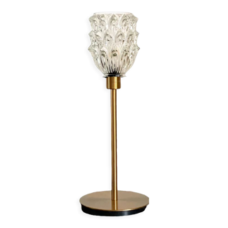 Table lamp with an antique glass lampshade in the shape of a tulip