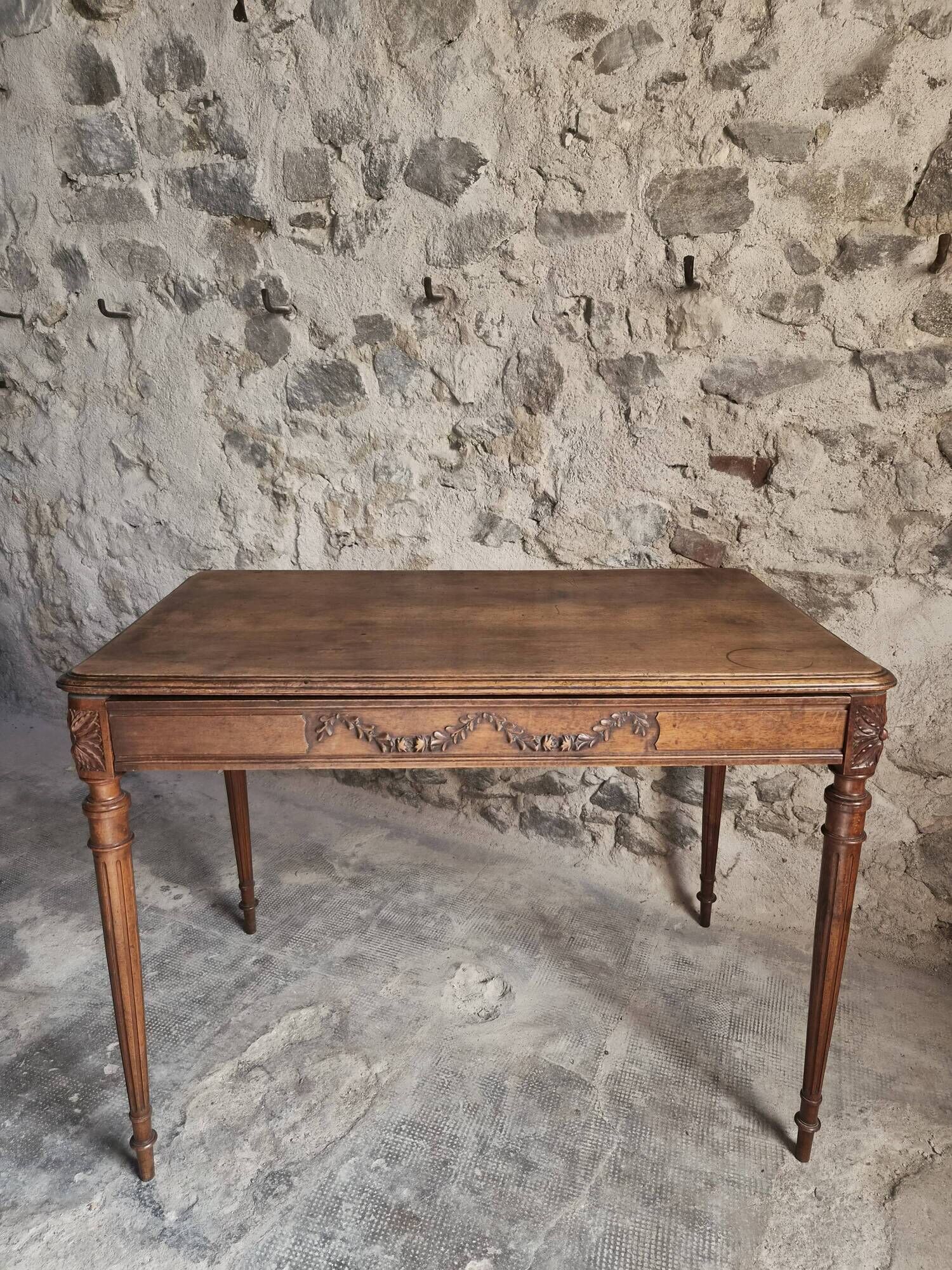 French antique writing desk in walnut, Louis XVI style, late 19th century, circa 1880–1900.