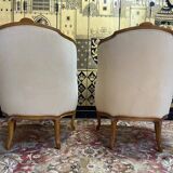 Paire de fauteuils bergères gondoles de style Louis XV