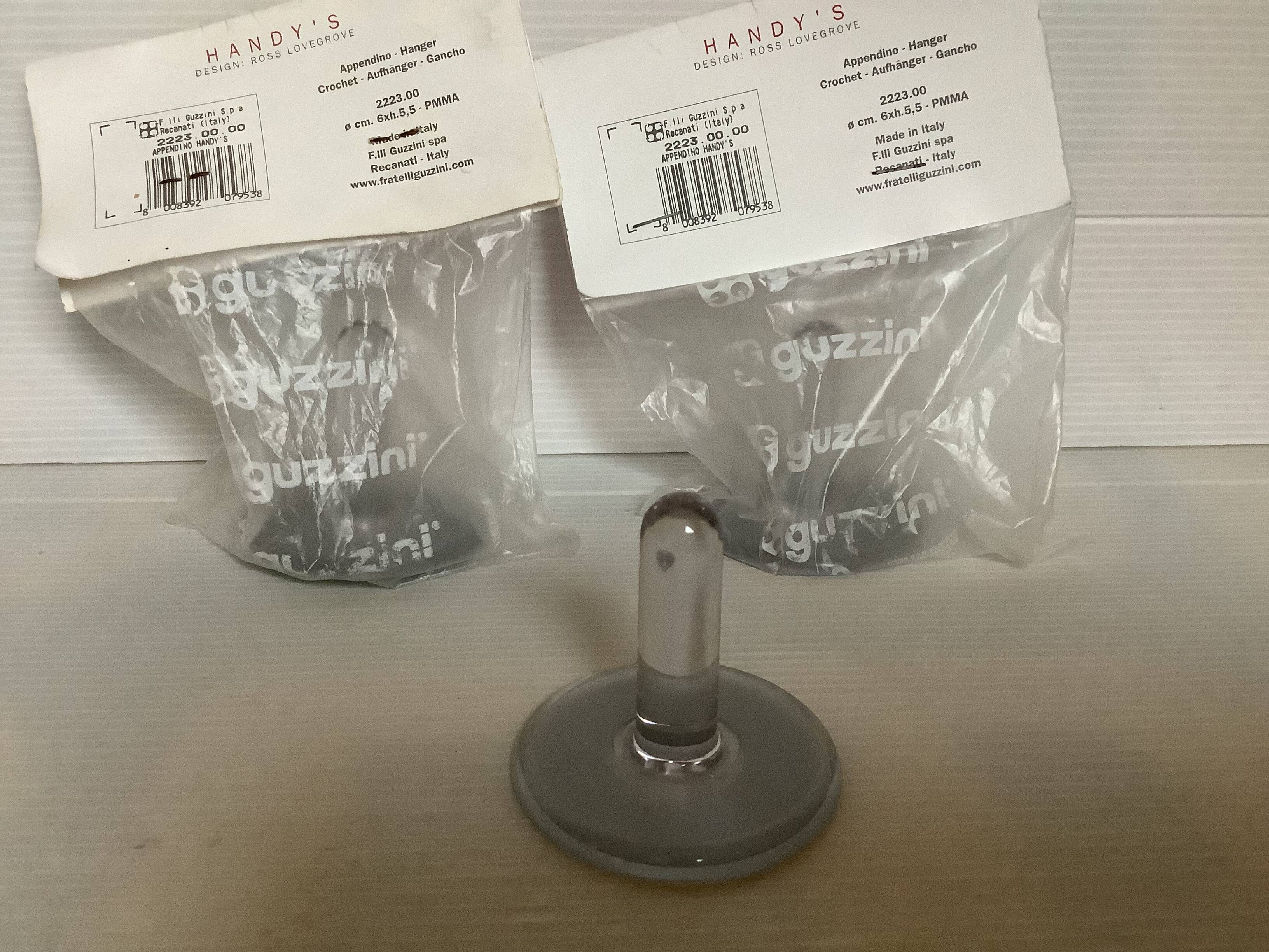 Trio of guzzini coat hooks design Ross Lovegrove plexiglass