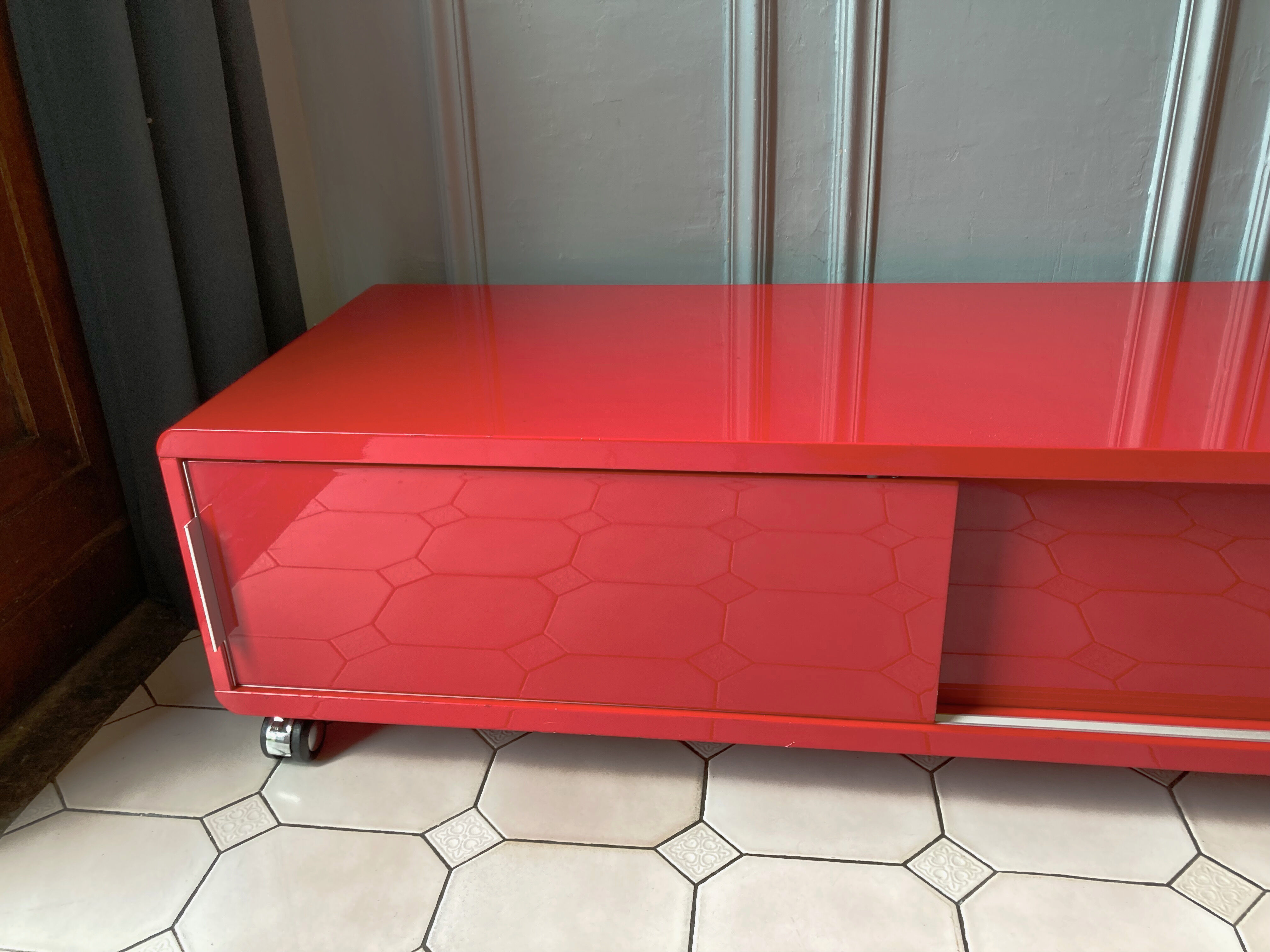 Lacquered red tv cabinet