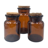 Three amber vintage jars