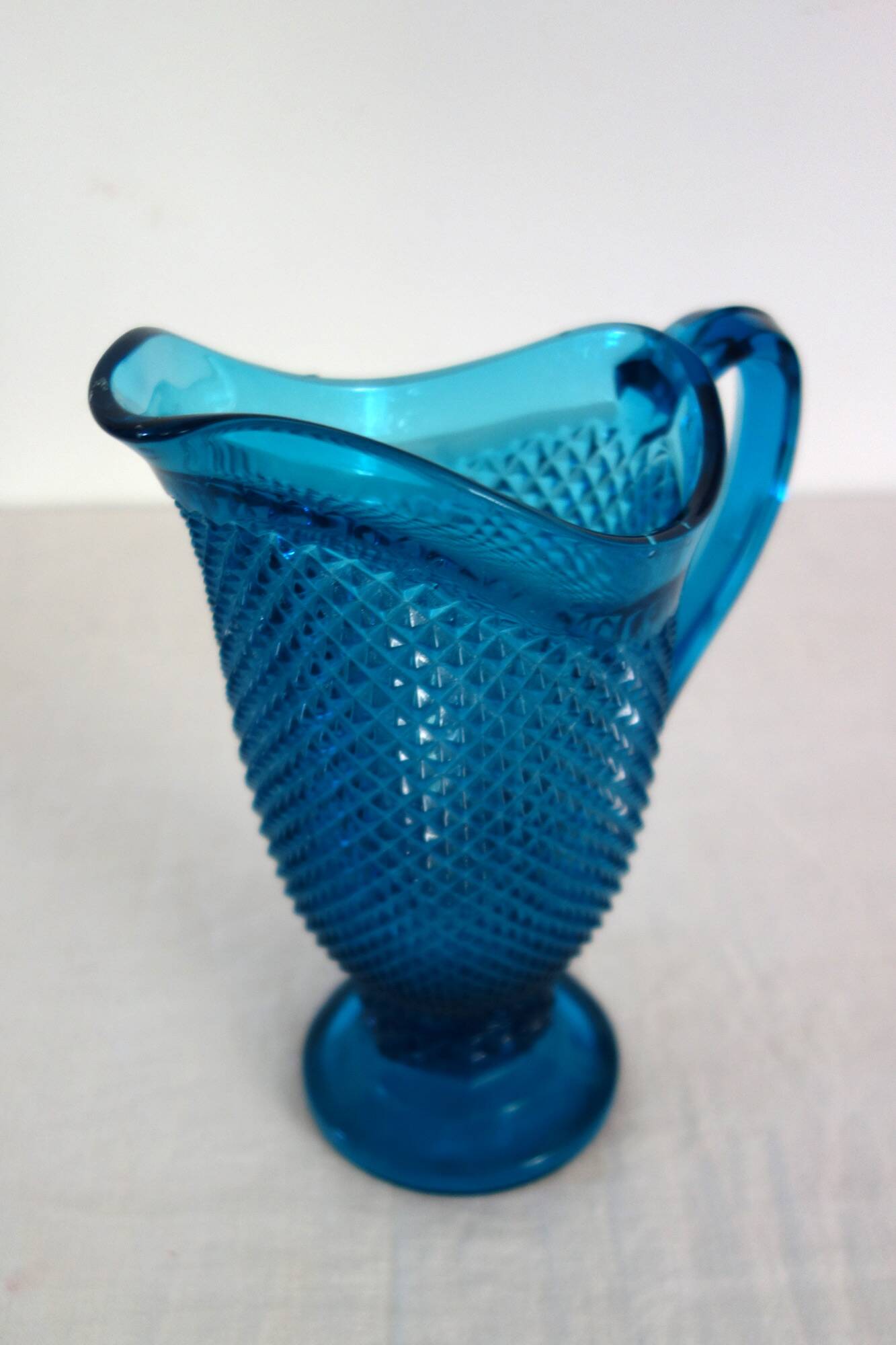 Vintage cut glass blue pitcher